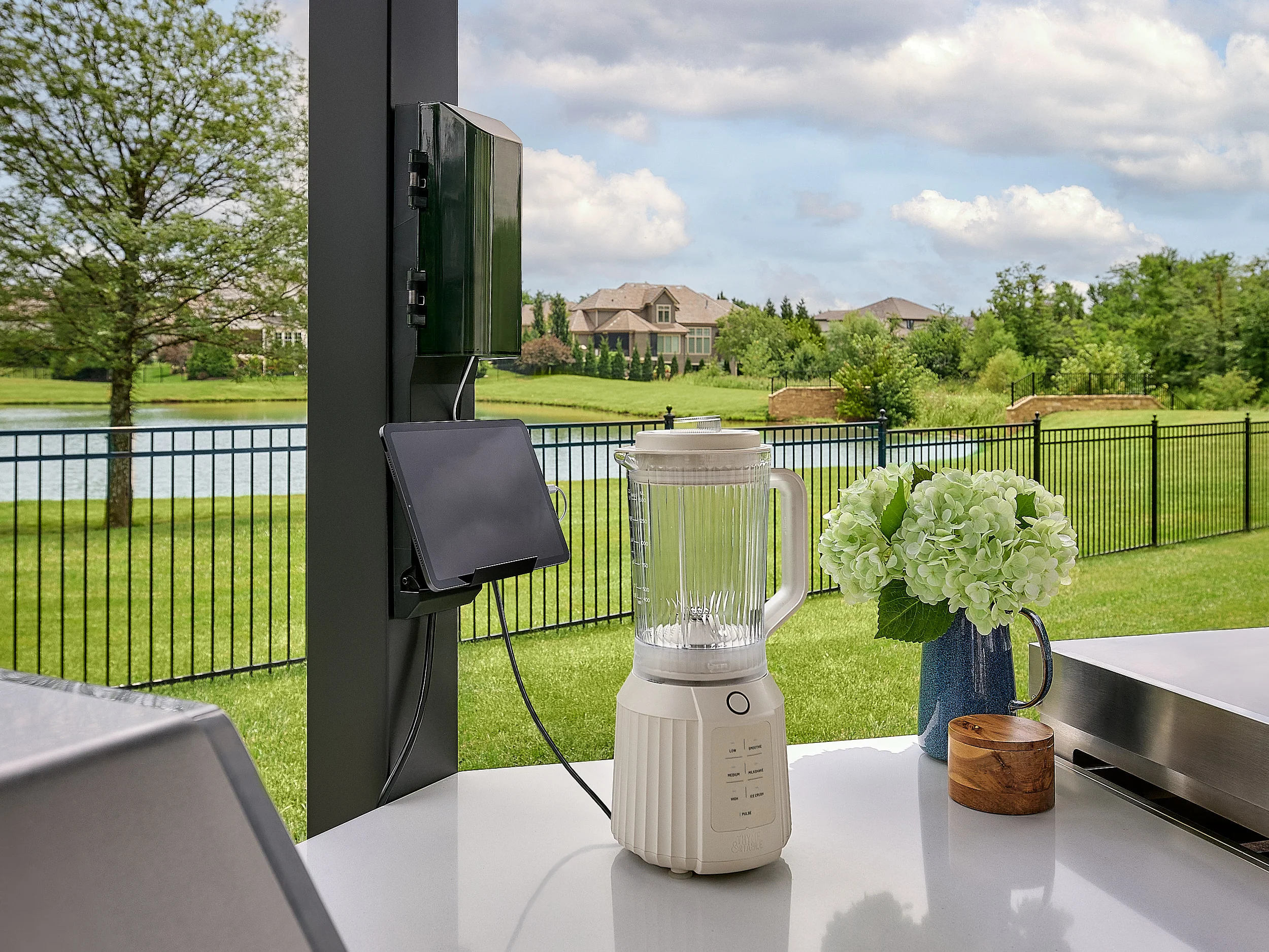 Edgemont Cove | Curved Outdoor Kitchen with Built-In Grill, Griddle & Pizza Oven - Image 25