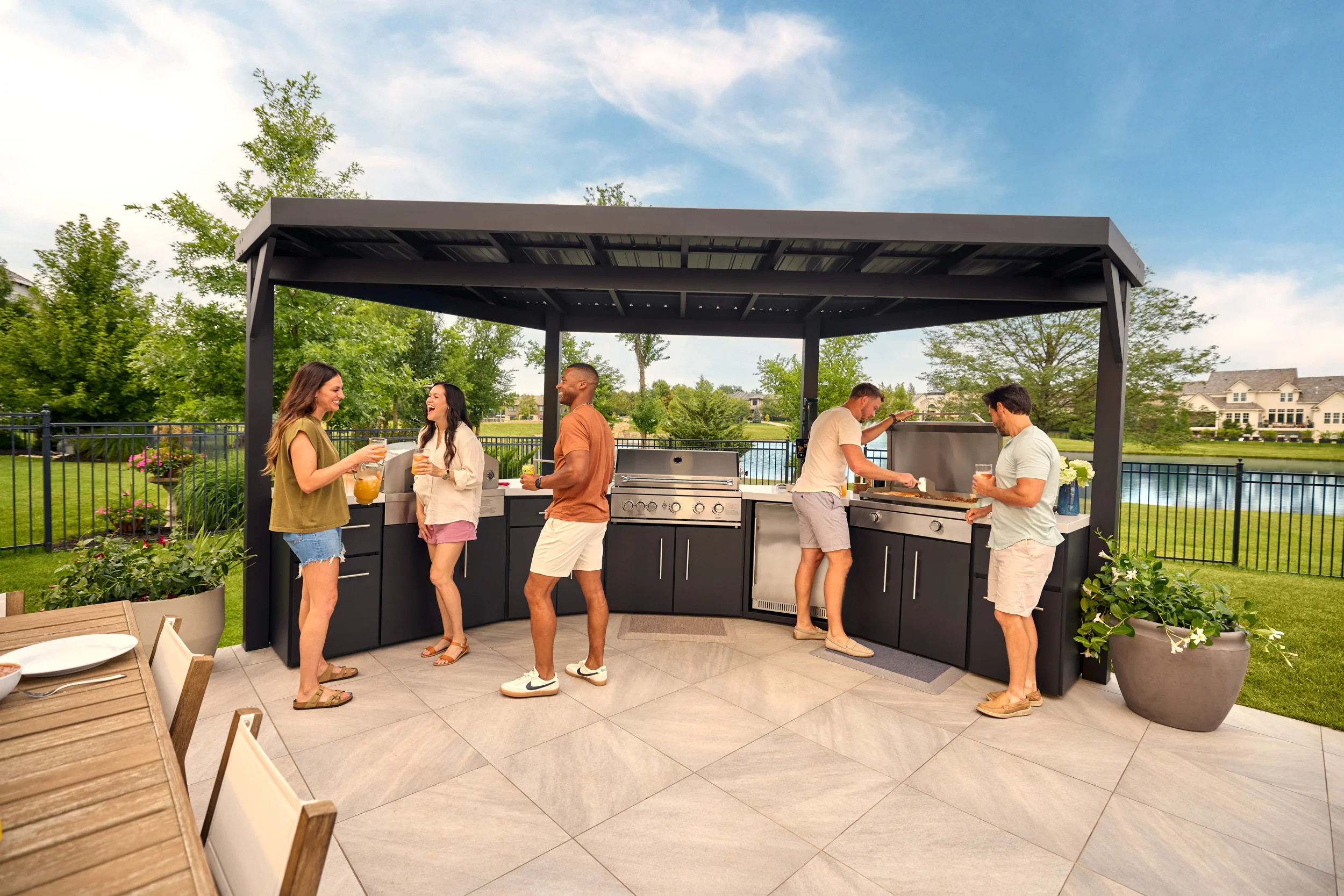Edgemont Cove | Curved Outdoor Kitchen with Built-In Grill, Griddle & Pizza Oven - Image 31