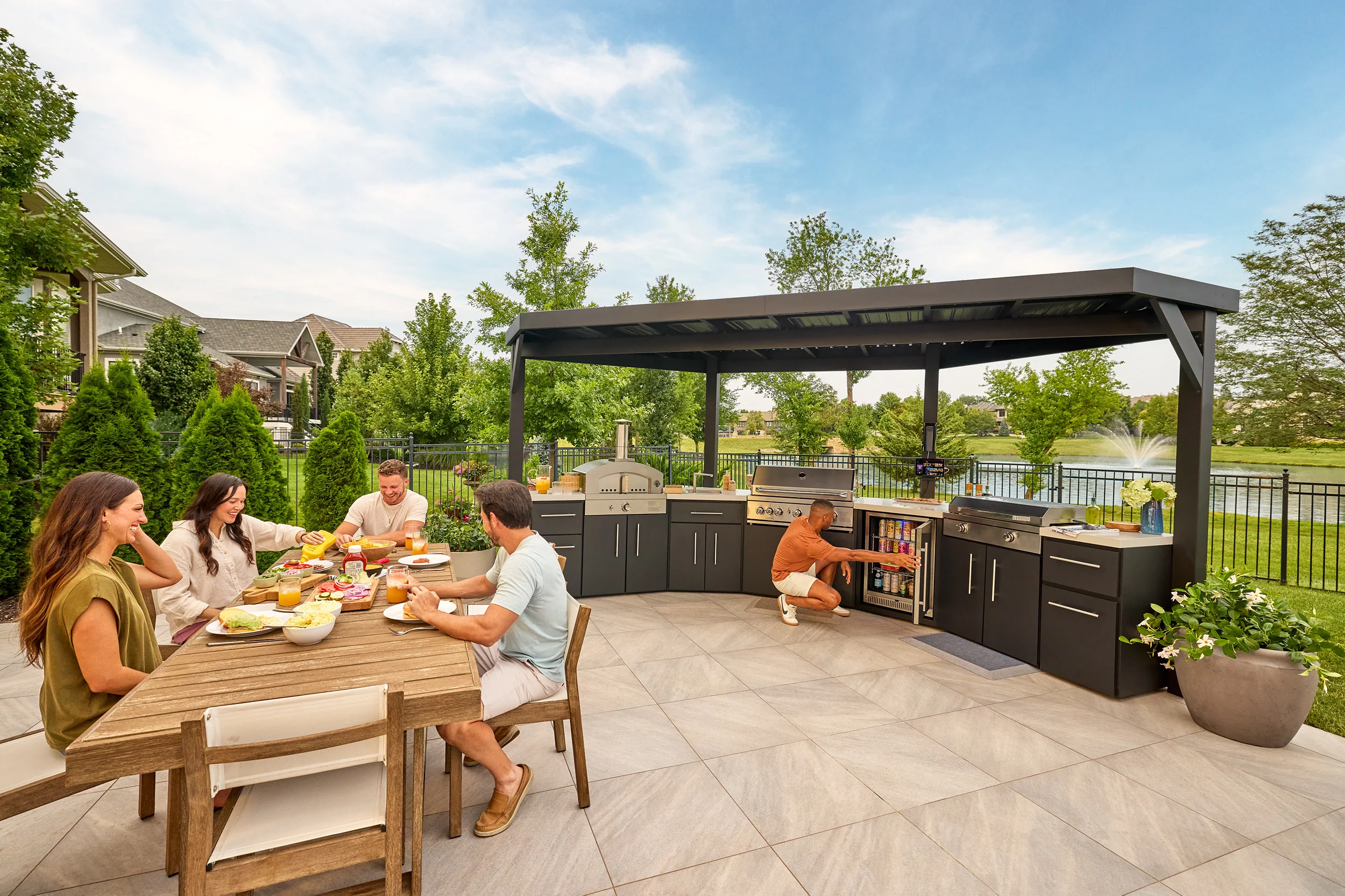 Edgemont Cove | Curved Outdoor Kitchen with Built-In Grill, Griddle & Pizza Oven - Image 32