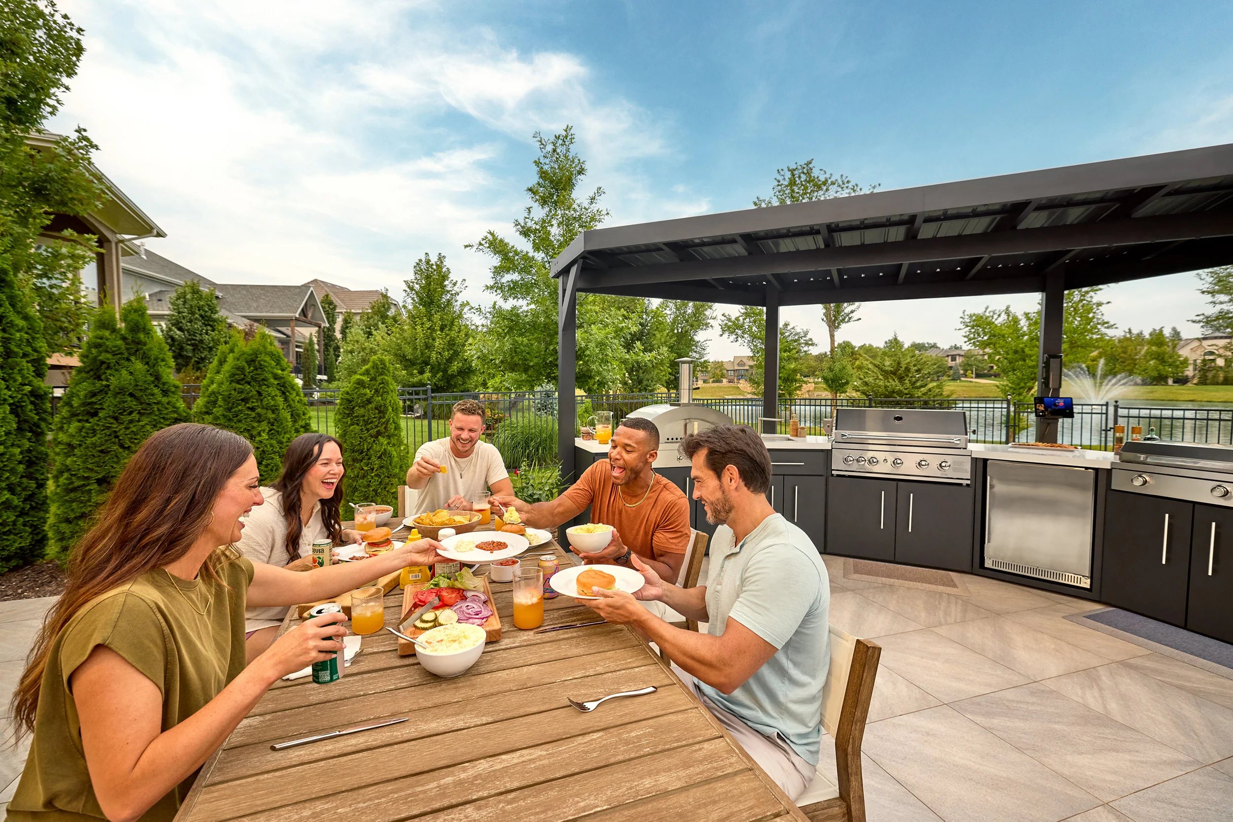 Edgemont Cove | Curved Outdoor Kitchen with Built-In Grill, Griddle & Pizza Oven - Image 33